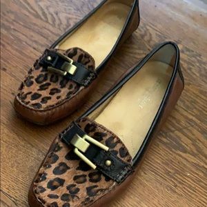 Brown leopard design loafers.